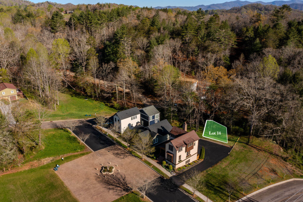 Aerial view of Sanctuary Village with Homesite 14 - Pigeon River estimate property lines.