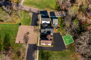 Aerial view of Sanctuary Village with Homesite 14 - Pigeon River estimate property lines.