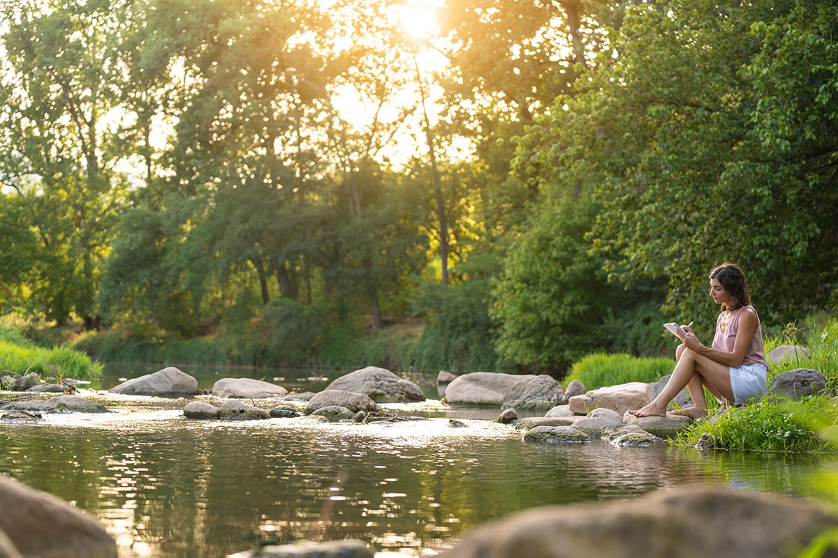 Reading near the flowing water of a river can boost mental-health.