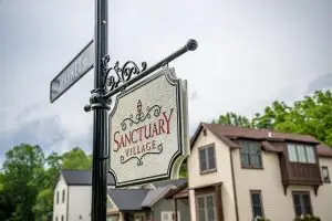 Sanctuary Village sign