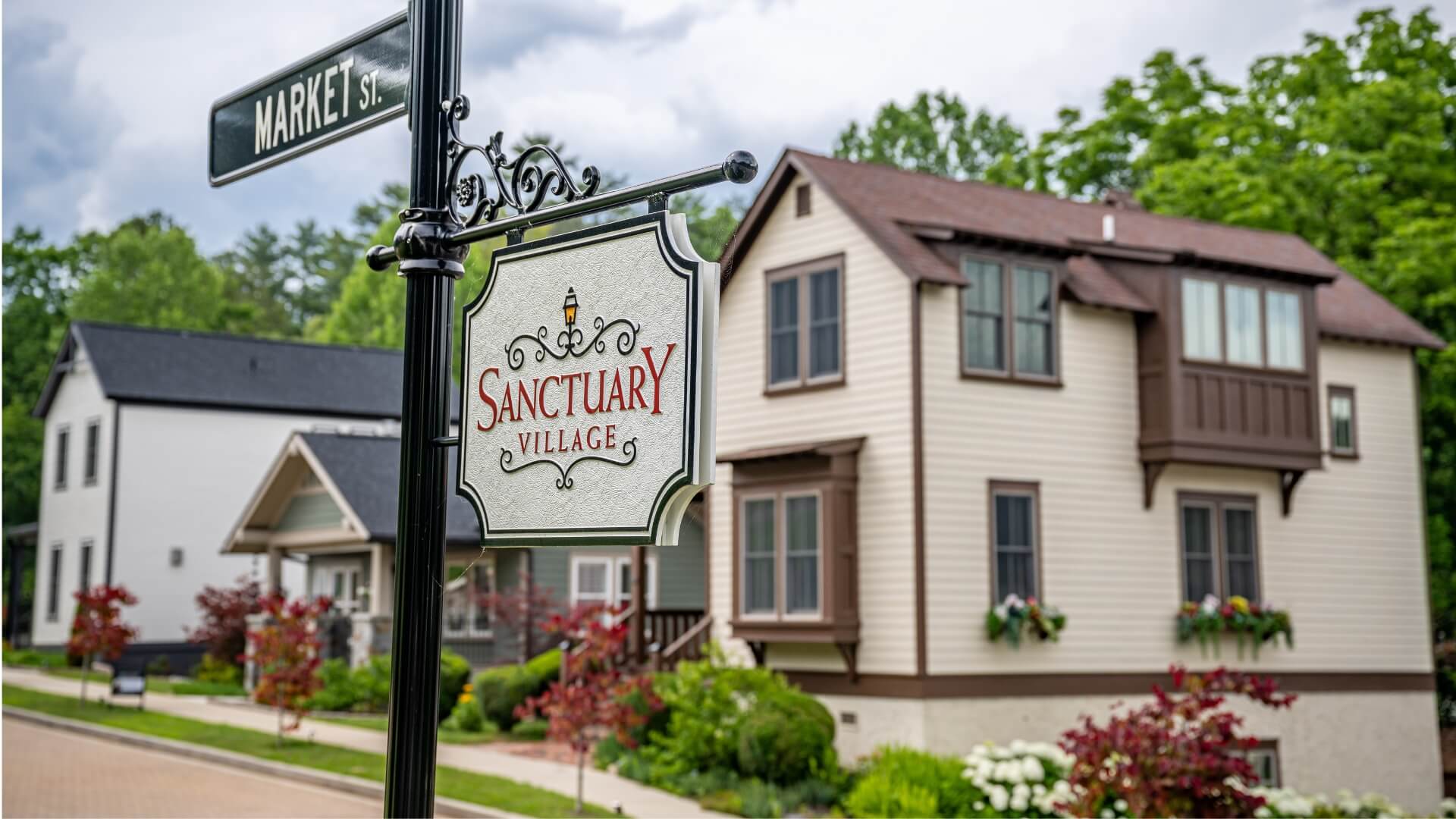 Sanctuary Village sign