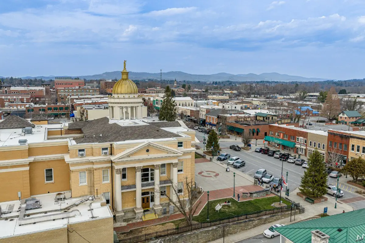 Aerial view of Downtown Asheville NC showing street with cars and buildings